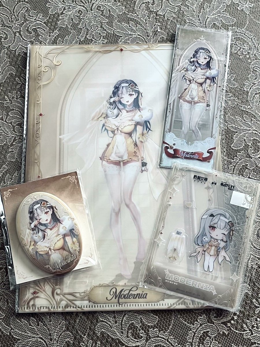 ntn01l's tweet photo. ということで「品名：モダニア」が届きました🫶
この前届いたオートリーのも写真上げちゃう
NIKKEのグッズは本当お上品さとえっちさの高度な融合が凄く素敵で美しくて可愛くて凄く好きです #NIKKE https://t.co/6q12IGxACA