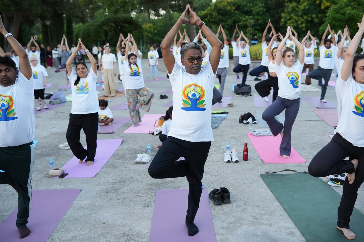 IndEmbGeorgia's tweet photo. 🇮🇳🧘‍♂️ On the occasion of the 12th International Day of Yoga, Embassy of India, Tbilisi organised a mass Yoga session at Rustavi Park on 27 June 2026, under the theme 'Yoga for Healthy Aging'. The event witnessed enthusiastic participation and it included common yoga protocol and meditation sessions.

It was organised in association with NGO Cultural Diversity for Peaceful Future (CDPF), the celebration brought together around 150 yoga enthusiasts, including local residents, yoga practitioners, members of the Indian diaspora, and friends of India.

The event was supported by Rustavi City Hall, Geosteel, Hindustan Silichem, Rasthal Indian Restaurant and Rustavi Azot, reflecting a shared commitment towards promoting health and well-being through yoga.

Addressing the gathering, Charge d'Affaires Mr. Subbu Ramesh encouraged participants to embrace yoga as a lifelong practice for physical, mental and emotional well-being. 

A beautiful celebration of wellness, unity and the enduring friendship between India and Georgia. 🇮🇳🇬🇪

#InternationalDayOfYoga #IDY2026 #YogaForHealthyAgeing #Rustavi #IndiaGeorgia

@PMOIndia 
@MEAIndia 
@mygovindia 
@airnewsalerts 
@MinOfCultureGoI 
@iccr_hq 
@NGOCDPF