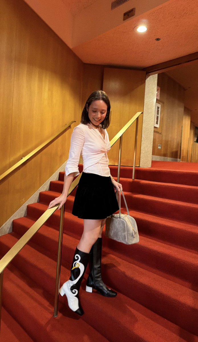 lauversdiscord's tweet photo. laufey wearing the fsg black &amp; white square toe swan patchwork boot!! https://t.co/emLHke7FLK