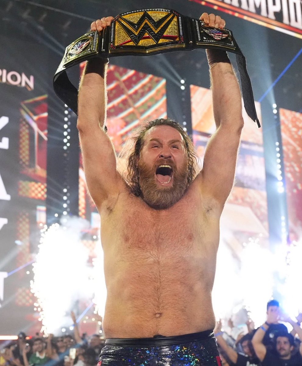 WrestlePurists's tweet photo. Woke up in a world where Sami Zayn is the WWE Champion 

Still feels surreal https://t.co/DgvCGAtSQF