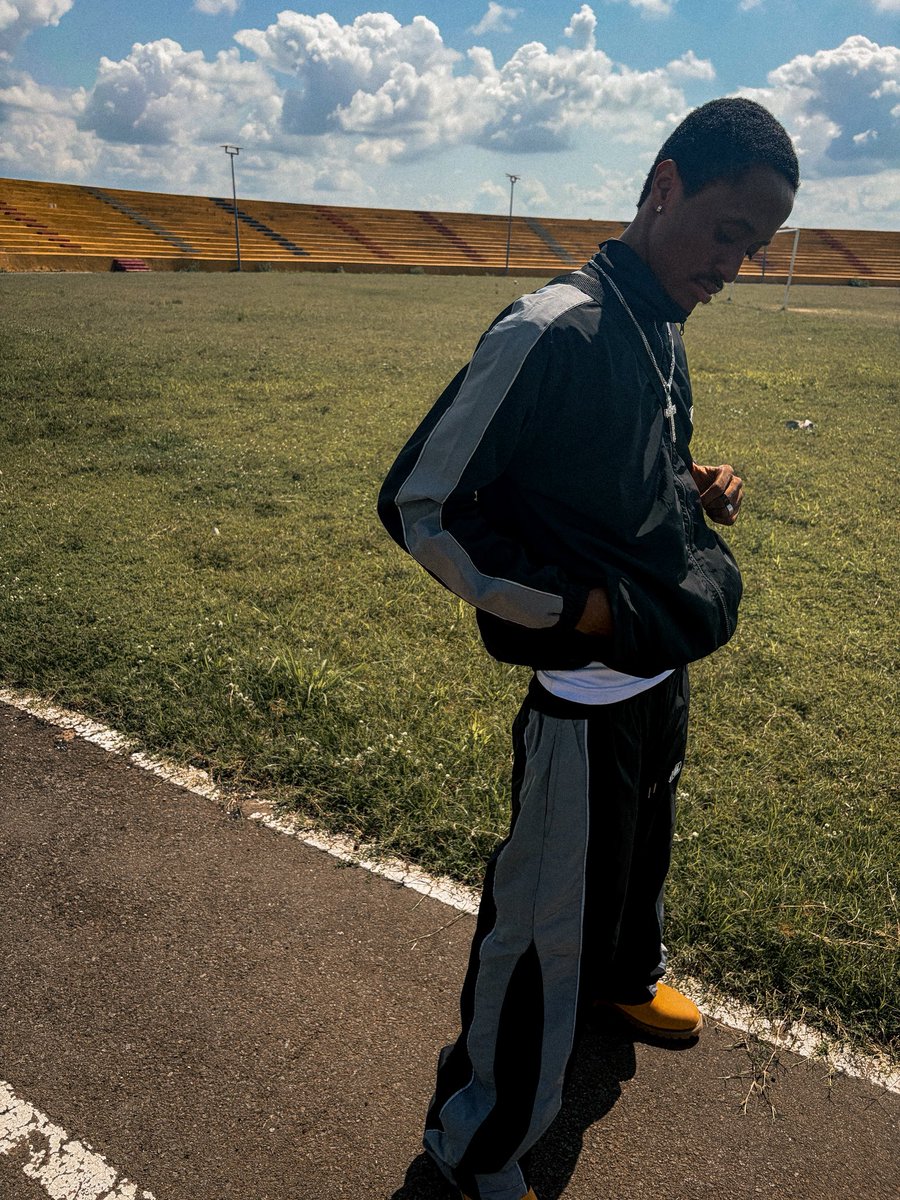 praisepal_'s tweet photo. I am a clothing brand owner and I just dropped this tracksuit. 
cop or drop? https://t.co/YqCXC0Mwws