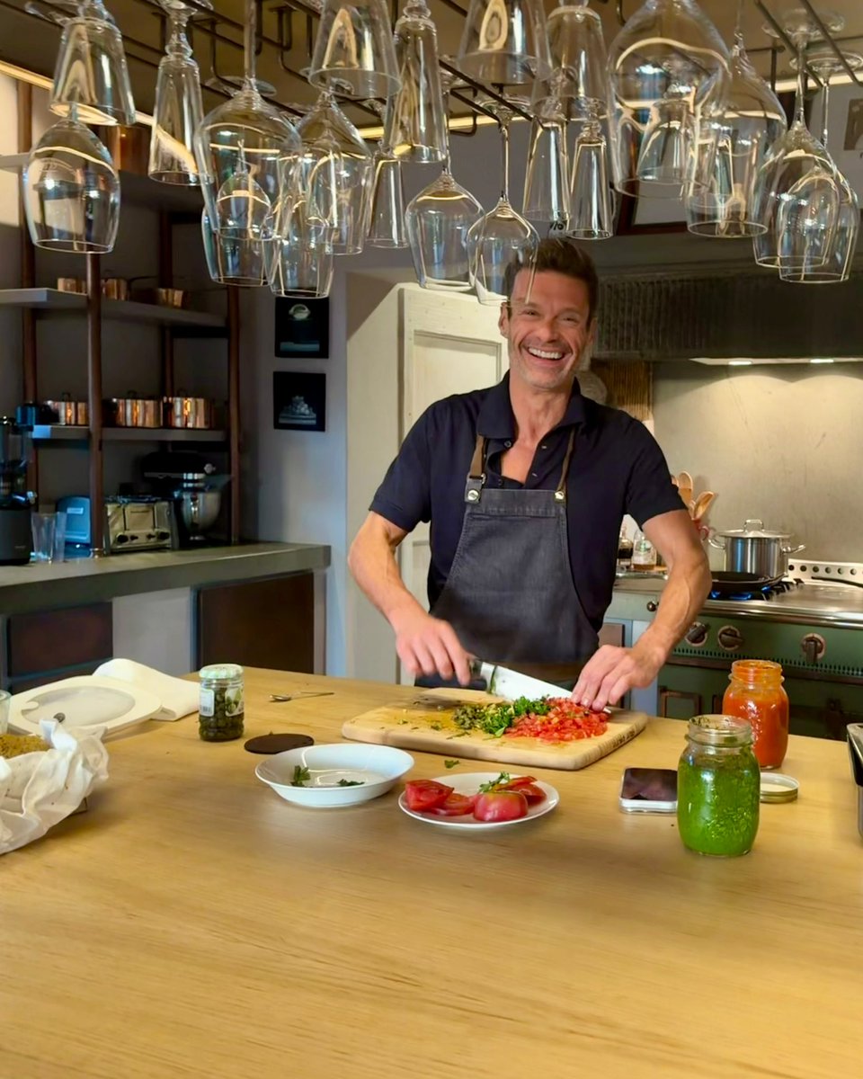 RyanSeacrest's tweet photo. A foodie’s paradise: home cooked meal Branzino with tomatoes and olives! #NationalFoodieDay https://t.co/KjGonHlEVY