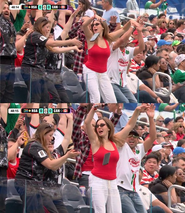 TrollFootball's tweet photo. She joined the Mexican wave and forgot her phone was in her hand https://t.co/GXZ28iO1fC