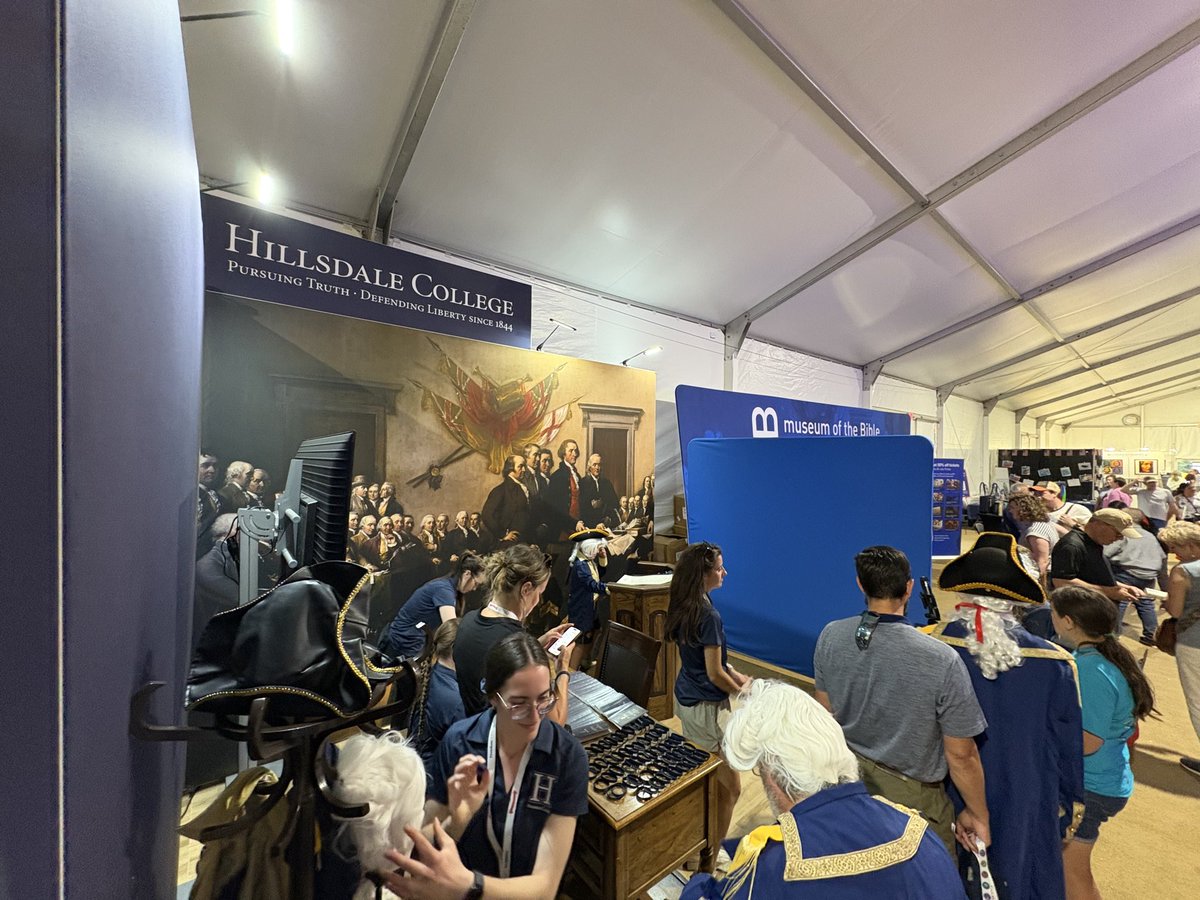 Hillsdale's tweet photo. @TinPotPourri @hughhewitt @OKCPD It’s been pretty crowded at our booth the past few days. 🤷‍♂️ Come and join us. Do some patriotic dress up. Sign the Declaration of Independence. https://t.co/c1ab11C9aw