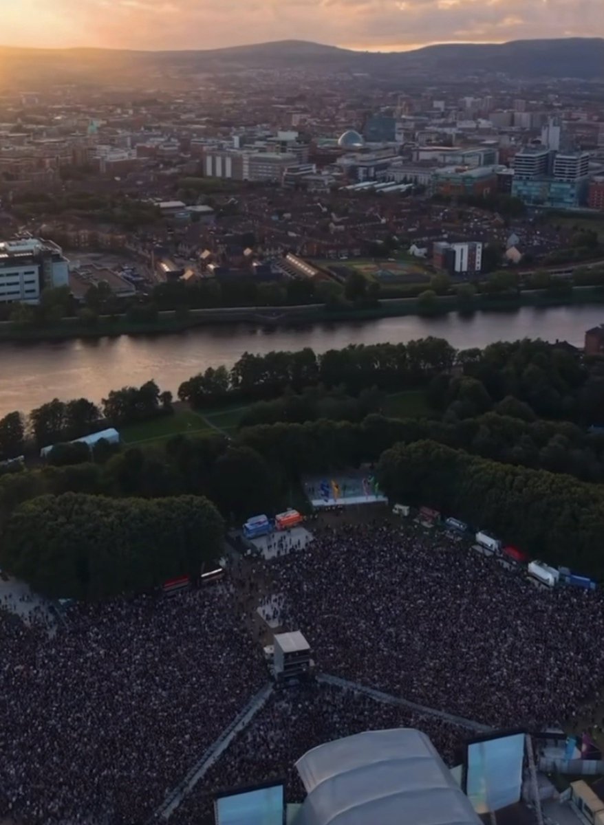 cureation's tweet photo. Stunning aerial images of @thecure's show in Belfast, Northern Ireland, as night falls with the upcoming Full Strawberry Moon 🌕  Where we got 3 tour debuts, Cold, 100 Years and Never Enough! https://t.co/vO46i345rk