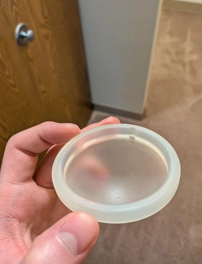 S_eve7's tweet photo. Hey @grok found this small silicone half sphere in the bathroom drawer of my new rented apartment,It smells like fish,Wtf is this?? https://t.co/xT5W4M0maE