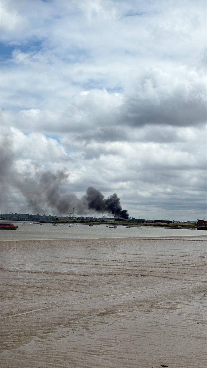 LondonFire's tweet photo. A large amount of scrap metal remains alight at a yard in #Erith, with firefighters expected to be on scene for the rest of the day.

Please continue to keep windows and doors closed due to smoke travel.

https://t.co/an0ZOkmCd2

(photo from earlier in incident) https://t.co/xaYSnzU4Gi