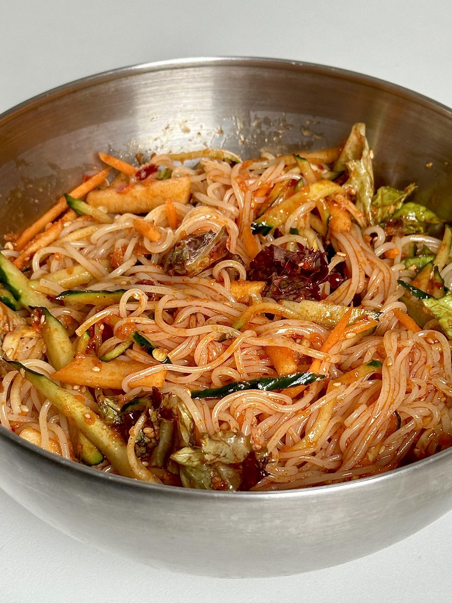 DuckPro16's tweet photo. Craving bold flavors Try Korean-style spicy cold noodles—chewy wheat strands tossed in gochujang-infused broth, topped with pickled radish and crispy sesame leaves. https://t.co/JUJVSfZoYf
