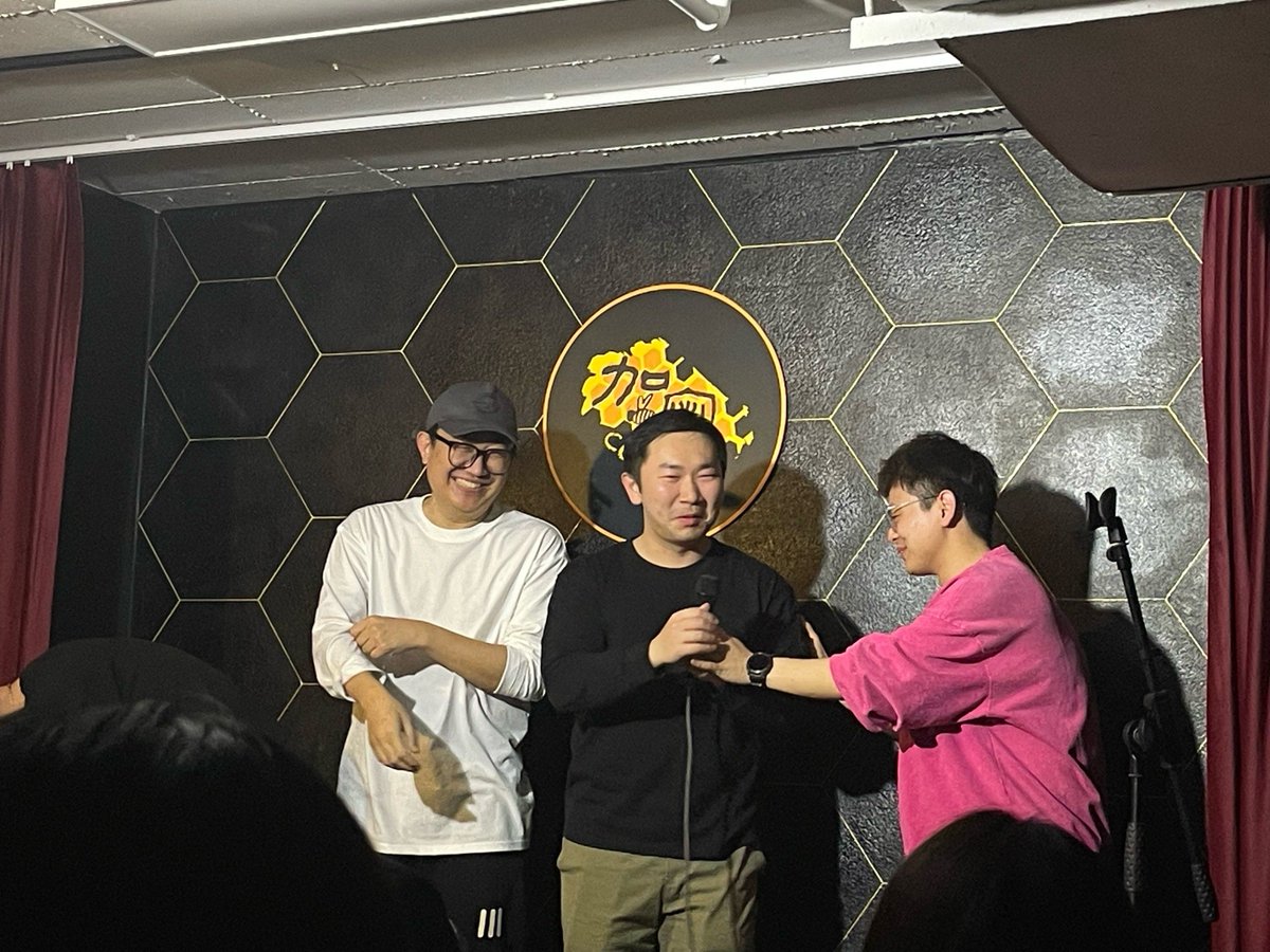 Sergeybbbrrr's tweet photo. Just spotted a guy in the front row wearing a "World's Okayest Comedian" hoodie. Sir, that's a direct challenge to my entire set tonight. https://t.co/gWTwkvrL93