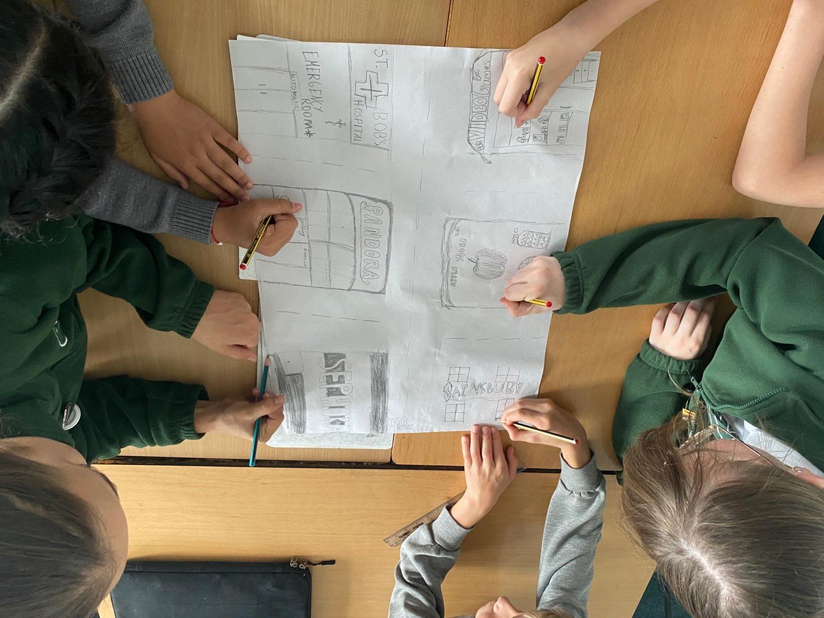 ManorParkSchSM1's tweet photo. Year 6 wrapped up My Money Week by exploring our 'Community' theme! They built their own high street and debated the pros and cons of going cashless. Brilliant critical thinking about how digital money impacts local shops and shoppers! #MyMoneyWeek #WeAreLEO #MPPAmaths https://t.co/Srm1KJ1MsV