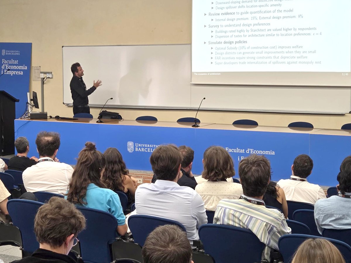 FundacioIEB's tweet photo. The first plenary session of the IEB 8th Workshop on #UrbanEconomics is now underway.   

Gabriel @Ahlfeldt, from @HumboldtUni, is presenting "The Economics of Architecture" https://t.co/EVxiDbDGV1