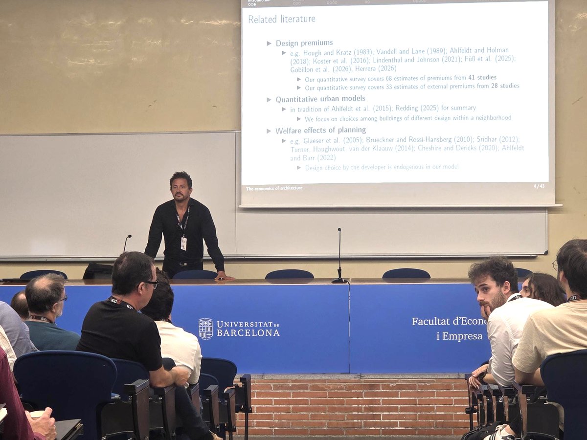 FundacioIEB's tweet photo. The first plenary session of the IEB 8th Workshop on #UrbanEconomics is now underway.   

Gabriel @Ahlfeldt, from @HumboldtUni, is presenting "The Economics of Architecture" https://t.co/EVxiDbDGV1