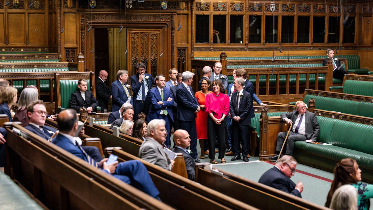 Members of Parliament wait to present their bill in the House of Commons Chamber.