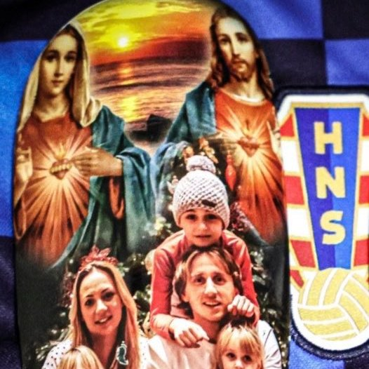 trad_west_'s tweet photo. Croatian Catholic player Luka Modric wears shin guard which has an image of the Virgin Mary, Jesus &amp; his family.

He is not ashamed of his Faith. https://t.co/oNdNRnESXP