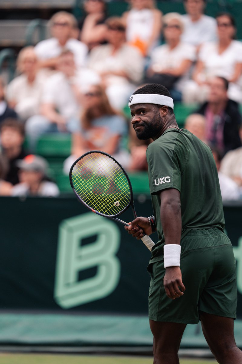 atptour's tweet photo. Big Foe is all business 💼

@FTiafoe plays a focused match to defeat Shimabukuro 6-4, 7-5 and reach the elite eight in Halle. 

@ATPHalle | #TWO26 https://t.co/EMTPI9YHyo
