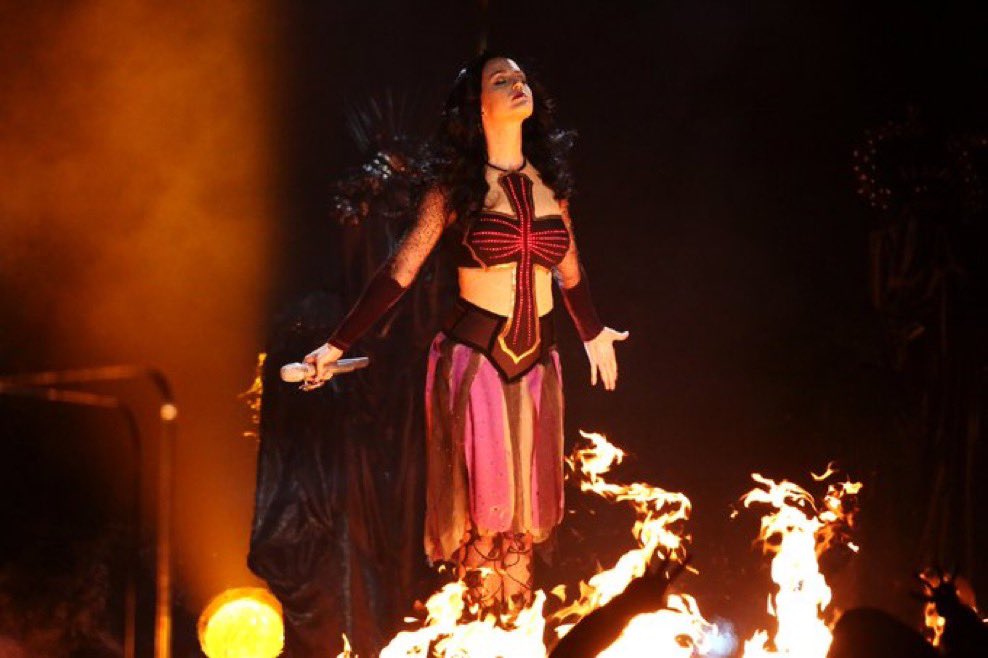 KatyActivity's tweet photo. “In the music video, I chose to embrace my darkness. I use it as a metaphor, and in the end, I find myself in a church where I leave behind my former self and am reborn. I’m baptized. It’s a conscious decision to choose the light.” 

— Katy Perry talks about the symbolism behind the “Watch It Burn” music video.