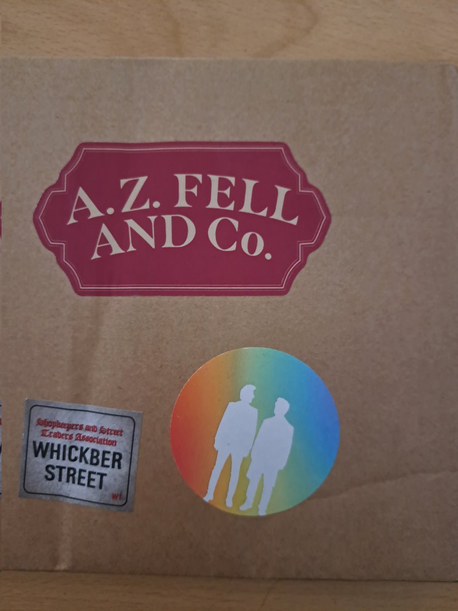 EmilyRose0101's tweet photo. #GoodOmens 
The pride merch came and with a free bookmark. The Aziracrow sticker on the front is so cute!! 

@GoodOmensHQ https://t.co/XDH5AoqVXG