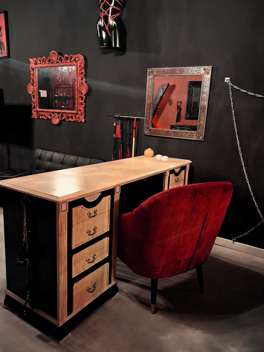 DungeonMarbella's tweet photo. A desk, a chair, a red glow, and absolutely no paperwork you would want HR to see. Welcome to the office. #BDSM #Marbella #TempleOfChains https://t.co/af5NqQX8xN