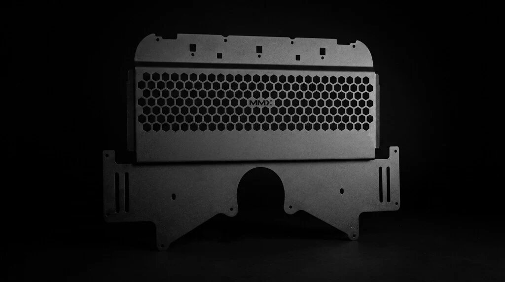IndStyle's tweet photo. One of the most vulnerable components on the BMW G8X platform is finally getting the protection it deserves.

Launching June 22, the new MMX Performance G8X M2 / M3 / M4 Oil Cooler Guard was engineered to protect the factory S58 oil cooler without compromising cooling performance. Developed through CAD scanning, extensive prototyping, and validated at the Nürburgring, it delivers OEM-quality fitment with precision-folded 6061-T6 aluminum construction and an airflow-optimized hexagonal grille.

Want to see how it was developed and what sets it apart? Read our latest blog for an inside look at the engineering and testing behind MMX's newest release.

https://t.co/MQAq2426r0

#BMWM2 #BMWM3 #BMWM4 #S58 #MMXPerformance #Nurburgring #INDDistribution
