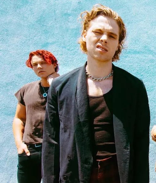sidequestist's tweet photo. why is he constantly lingering behind luke in this photo shoot 😭 https://t.co/ItbA3QrJJ5