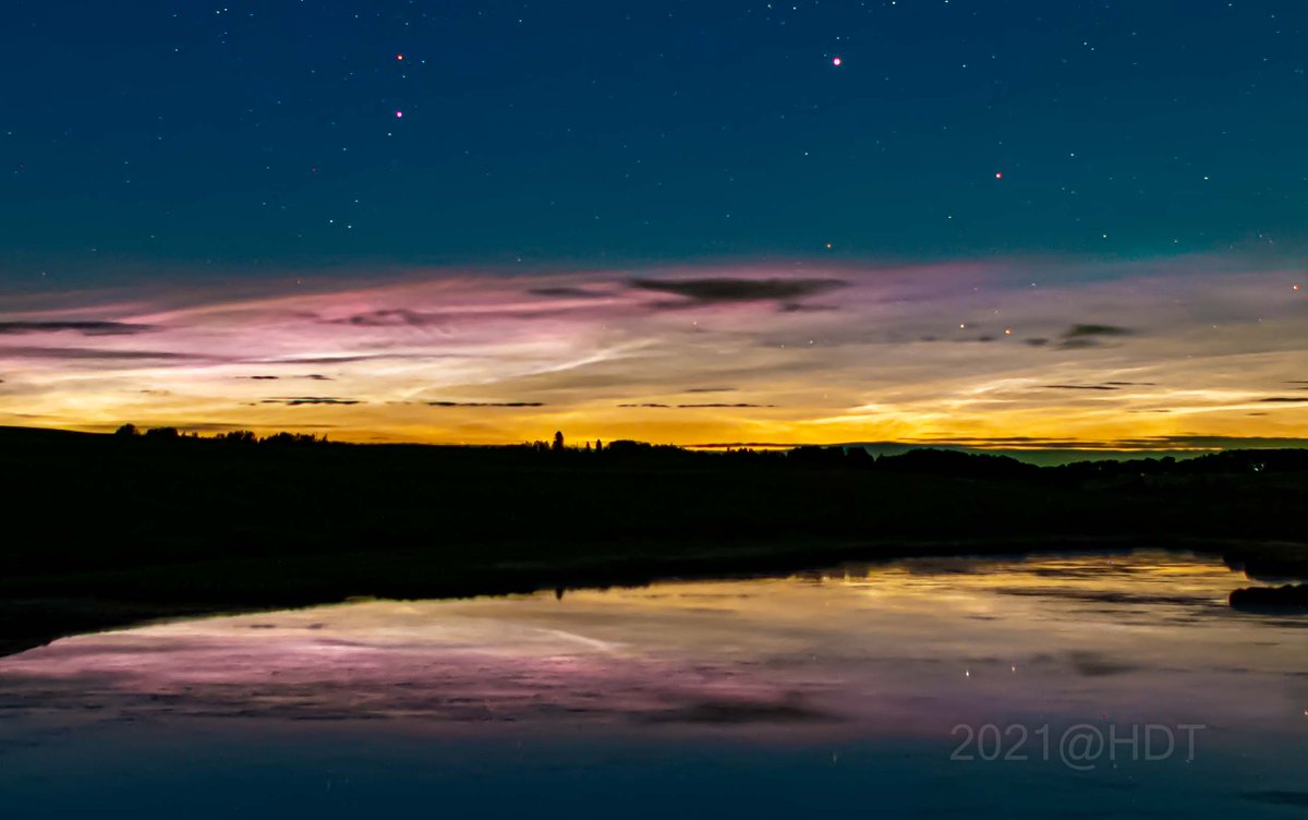 theauroraguy's tweet photo. From the archives this day June 17, 2021

Northwest of Calgary various locations along TWP-274

Noctilucent Clouds the aurora borealis northern lights made an all night appearance Northwest of Calgary, for the entire night.  In the morning the NLC's were 360 degrees filling the entire sky.  The aurora borealis northern lights even made a brief appearance around 0330 MST.