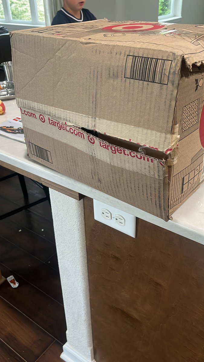 ChrisDrez's tweet photo. Seriously @Target and @FedEx ? This literally looks like the package Ace Ventura delivered to steal a dog. “Sounds broken.” “Most likely is, but I’m sure it was something nice.” https://t.co/oBavuPUkoT