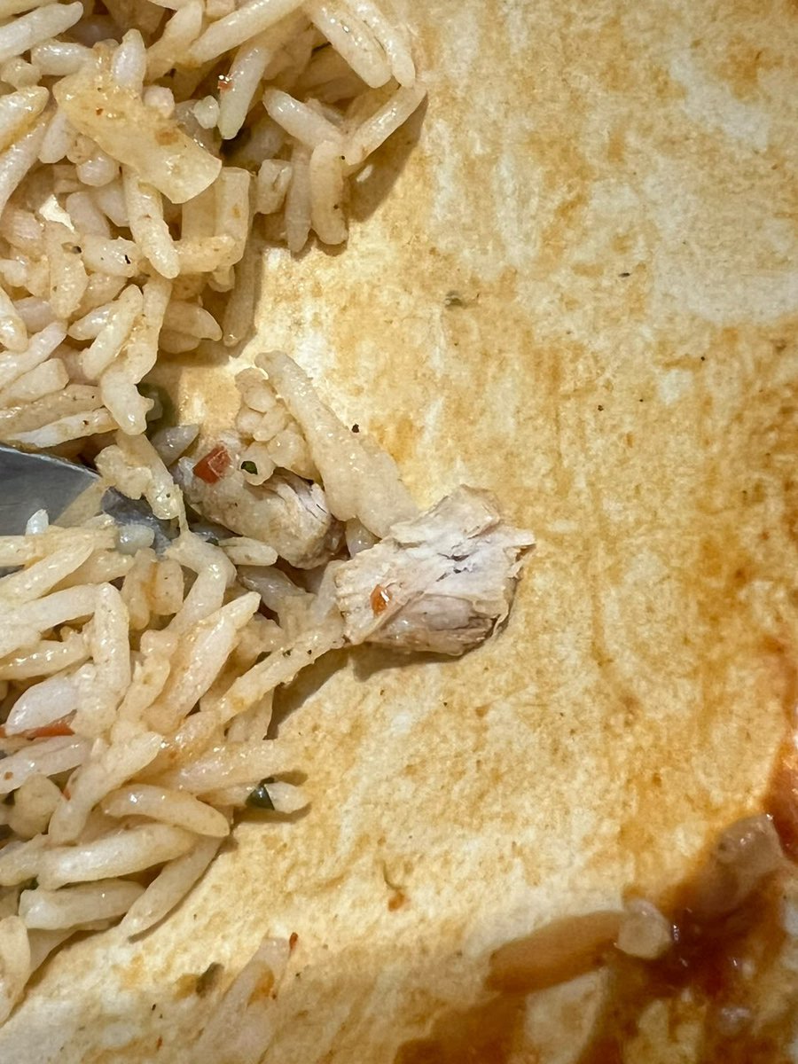 Ramakrishnan_S9's tweet photo. This is NOT okay. My vegetarian order — Barbeque Paneer Rice Bowl from @Cali_Burrito via @Swiggy — had what appears to be a chicken bone/meat piece in it. Serving meat in a veg order isn’t a “mistake,” it’s a food safety and trust issue. @swiggy_care @swiggyindia explain this. https://t.co/GLdFfJGQh4