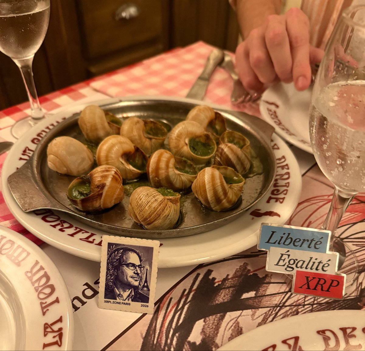 Vet_X0's tweet photo. ❤️Paris was amazing.

$XRP is global and everywhere. People are working hard on all fronts. Adoption, security, innovation and research.

We have cultivated such a great culture and community. Driving the biggest revolution of money in history.

First time i tried snails 🐌, it came with a David postage stamp.