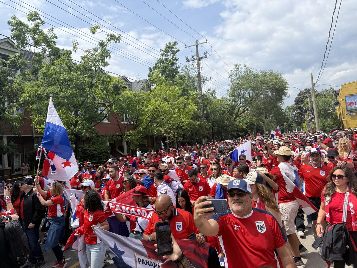 Jerrmainewilson's tweet photo. The Panama supporters march has grown dramatically. What first appeared to be a few hundred fans now looks to be a few thousand people making their way toward the stadium grounds. #FIFAWorldCup #WeAreToronto https://t.co/x1dJZTxaEm