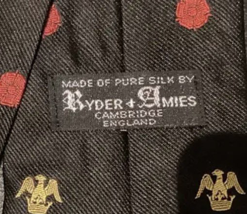 DylanMinett's tweet photo. @Tomsconcepts @claydon_calder First image is from a tie for sale on eBay, although I don’t know its age. Second image is of the label currently used on their scarves, as shown on their website. https://t.co/O5B0PqhCNo