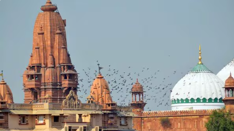 Saatvata's tweet photo. Not just any temple, but the site one of the greatest Hindu temples in antiquity.
It was much larger than any extant Gupta-era temples in North India today (Daśāvatāra temple in Deogarh, Nācnā-Kuṭhārā temple complex [Caturmukhanātha, etc.], Bhītargāon temple in Kanpur, Lakṣmaṇa temple in Sirpur, etc.).
Unfortunately, like most significant North Indian temples (Bhojeśvara, Mārtaṇḍa, Mūlasthāna, Somanātha, etc.), it too was destroyed in the first few centuries of Islamic conquest.

The grandeur of the holy city of Mathurā and its Vāsudeva temple was described as follows by al-ʿUtbiyy.

fa-raʾā mā yuk͟hālifu l-ʿādāti wa-yaftaqiru ruwātuhā ilā š-šahādāti bal al-mušāhadāt; baladan mabniyya l-sūri min ṣammi l-ṣuk͟hūr, wa-qad ušriʿa bābāni minhā ilā l-māʾi l-muḥīṭi bih. mawḍūʿatan abniyatuhu fawqa šawāk͟hīṣi l-qilāl, ṣiyānatan lahā min maḍārri suyūli l-māʾi wa-maġāri ġuyūthi s-samāʾ.

wa-ʿan janabayhā alfu qaṣrin šabīhatin bi-sāʾiri l-abniyati fī l-withāqah, muštamilatan ʿalā buyūti aṣnāmin qad hundimat mafāṣilu aʿrāqihā bi-masāmīra tusāwī suṭūḥa l-bināʾ, wa-tuwārī mā warāʾahā mina l-ḥuzūzi taḥta l-k͟hafāʾ.

wa-fī ṣadri l-baladi baytu aṣnāmin yaḥkī ak͟hwātahu aw aḥsan, wa-yajrī majrā aḍrābihi bal atqan. lā yahtadī l-kuttābu bi-aqlāmi l-dawāti wa-lā n-naqqāšūna bi-aṭrāfi l-k͟hāmāti ilā amthālihā taḥsīnan wa-tazwīqan wa-nuqūšan tak͟hṭafu l-abṣāra barīqā.

wa-kāna fīmā kataba bihi al-Sulṭān:
annahu law arāda murīdun an yabniya mā yuʿādilu tilka l-abniyata la-ʿajaza ʿanhā bi-infāqi miʾati alfi alfi dirhamin fī muddati miʾatay sanatin ʿalā aydī ʿamalatin kamalatin wa-maharatin saḥarah.
wa-fī jumlati l-aṣnāmi k͟hamsatun min ad͟h-d͟hahabi maʿmūlatun ṭūlu k͟hamsati adhruʿ, ʿaynā wāḥidin minhā yāqūtatāni qīmatuhumā k͟hamsūna alfa dīnārin bal azyad, wa-ʿalā āk͟har yāqūtatun zarqāʾu waznuhā arbaʿu-miʾatin wa-k͟hamsūna mit͟hqālā, fa-kāna jumlatu ad͟h-d͟hahabiyyāti al-mawjūdati ʿalā aḥadi l-aṣnāmi al-mad͟hkūrati t͟hamāniyatan wa-tisʿīna alfa mit͟hqāl.

"There he witnessed what utterly defies normal human experience, forcing those who hear reports of it to demand not just testimonies, but direct eyewitness confirmation.
He found a city whose defensive walls were built from solid rock, with two massive gates flung open directly onto the surrounding waters.
Its buildings were situated high atop the prominent peaks of the mountains, specifically designed to safeguard them from the violent ravages of rushing floodwaters and the deep pooling of torrential rains from the heavens.
Along both its flanks sat a thousand palaces, matching each other in absolute structural integrity and fortification.
Within them were temple chambers housing idols, where the gaps between the rows of stone blocks had been so perfectly engineered with iron clamps that they sat entirely flush with the surface of the walls, completely concealing whatever structural grooves lay beneath them under absolute secrecy.
In the very heart of the city stood a central temple that mirrored its sister structures, or was even more splendid, and ran parallel to its counterparts, though crafted with far more absolute mastery.
Neither scribes with the pens of their inkwells nor engravers with the tips of their reed brushes could ever hope to find a way to replicate its likeness by way of beautification, gilding, or intricate carvings that snatch away the eyes with their blinding brilliance.
And included in what Sulṭān (Ġaznawī) wrote [was the statement]:
"If an intender wished to build the likes of these buildings, he would be incapable of it, even with the expenditure of one hundred million dirhams over a period of two hundred years, at the hands of master craftsmen and magicians."
Among the collection of idols were five made of gold, measuring five cubits in height. The eyes of one of them were two rubies worth fifty thousand dinars- nay, even more.
Upon another idol was a blue ruby weighing four hundred and fifty mit͟hqals. In total, the gold items found on just one of the aforementioned idols amounted to ninety-eight thousand mit͟hqals." 

How did the Sulṭān Ġaznawī destroy such a massive structure?
They used a technique known as sapping.
The soldiers would would dig out the mortar and remove supporting blocks from the base of walls or columns.
They would then pack the tunnels and wooden props with bundles of brushwood and pour liquid naphtha over everything.
The weight of the massive stone roofs and upper walls would then pancake downward and collapse the entire temple into its own footprint.
Additionally, iron clamps were used to hold the stones together.
Extreme heat from the naphtha fire softens and melts the iron components while causing the surrounding stone to fracture into pieces.

A smaller temple was later constructed at the site, yet it too was destroyed under Sikandar Lodī.

Hindus were barred from performing ritual ablutions in the Yamunā river, local barbers were barred from performing tonsure of Hindu pilgrims, mosques and commercial markets were set up directly opposite the bathing stairs, and the idols were handed over to butchers to be used as meat-weights.

These restrictions were lifted during the reign of Akbar and Vīr Siṅgh Dev of Orchā built a grand temple at the site during the reign Jahāngīr.

This temple was destroyed by Awrangzēb and an ʿĪdgāh/Masjid constructed thereupon.
The city was also renamed to Islāmābād, though this remained a strictly "daftarī" title and the residents of the city still referred to it as Mathurā:

"In this same realm of dignity (karāmat), the justice-nurturing, oppression-overthrowing, truth-aware, equity-increasing, tyrant-destroying monarch [viz. Awrangzēb ʿĀlamgīr], the morning-breeze of triumph which wipes away the oppressor's abode and the reviver of the religion [viz. Islām] of the Best of Mankind [viz. Prophet Muḥammad] issued a fateful yarlīġ for the destruction of the temple of Mathurā known as the Dēhrā of Kēśav Rāī.
This decree was carried out in a short time through the great efforts of the officials, so that its destruction was firmly brought from potential into action and in its place, a lofty-founded mosque was constructed, at the cost of a considerable sum, replacing a house of misguidance with a newly established building of noble adornment...
Praise be to God for the religion of Islam! (al-ḥamdu li l-Lāhi ʿalā dīni l-Islām) For in this auspicious era of the eradicator of polytheism and rebellion, such a magnificent and seemingly impossible feat emerged from the hidden realm into the field of manifestation.
Seeing this strength of religious patronage and the majesty of worship of Allāh, the prideful Rājās' breath was caught in their throats. They stood still in bewilderment like figures with their faces to the wall.
The idols and icons, both great and small, adorned with precious jewels, which had been installed in that temple of the polytheists and gathering place of the irreligious were brought to Akbarābād (i.e. Āgrā).
There, they were buried beneath the steps of the mosque of Nawāb Qudsiyya Bēgam Sāḥib, so that they might forever be trampled underfoot.
The name of Mathurā was recorded in the registers/ledgers and proclaimed by word of mouth as "Islāmābād" (the abode of Islām)."