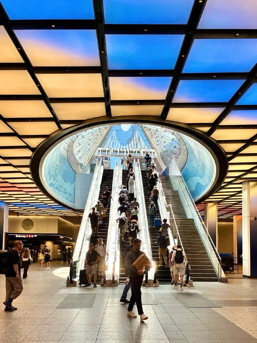 Orange and blue lights at Penn Station facing the East End gateway.