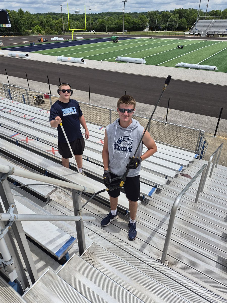 TwinsburgTigers's tweet photo. Day 38 Stadium Renovation Pictures...power washing of the home side bleachers is slowly but efficiently moving along thanks to @DylanFantone16 and @RathboneGavin64 and the turf is just about laid out and ready for stitching of markers and the underlay! https://t.co/jfjWcE0UQM