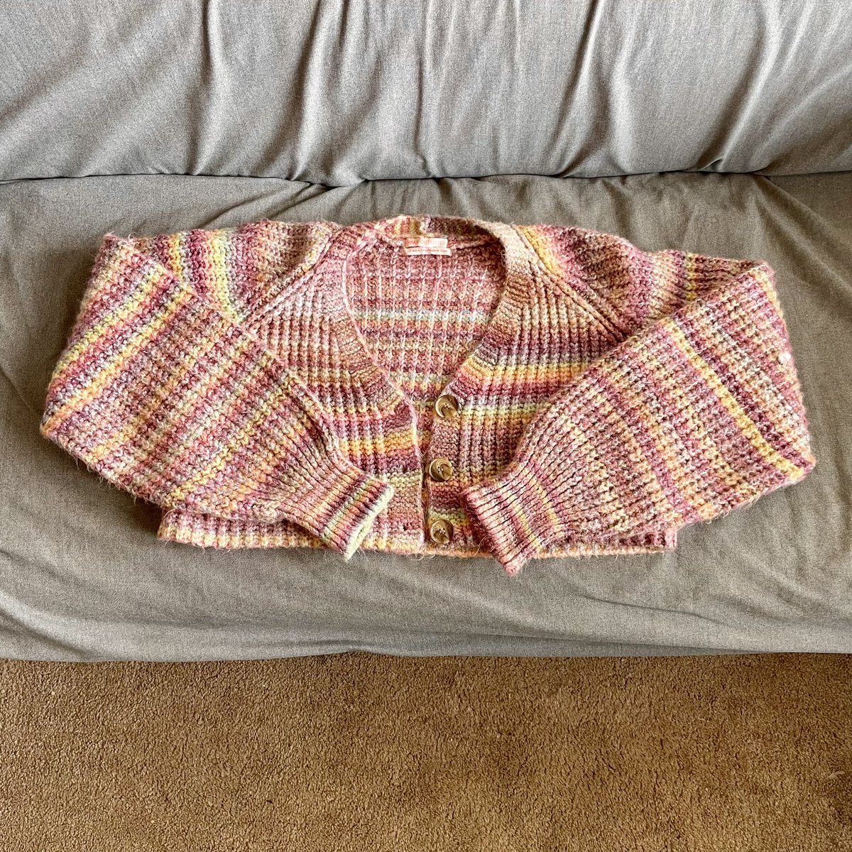 thpock's tweet photo. got a used sweater for $10 I'm going to take apart to reuse the yarn, one of the cheapest ways to get nice materials. my injured wrist isn't up for knitting or crochet yet but I can at least pull this one apart https://t.co/tDAs6UdDYc