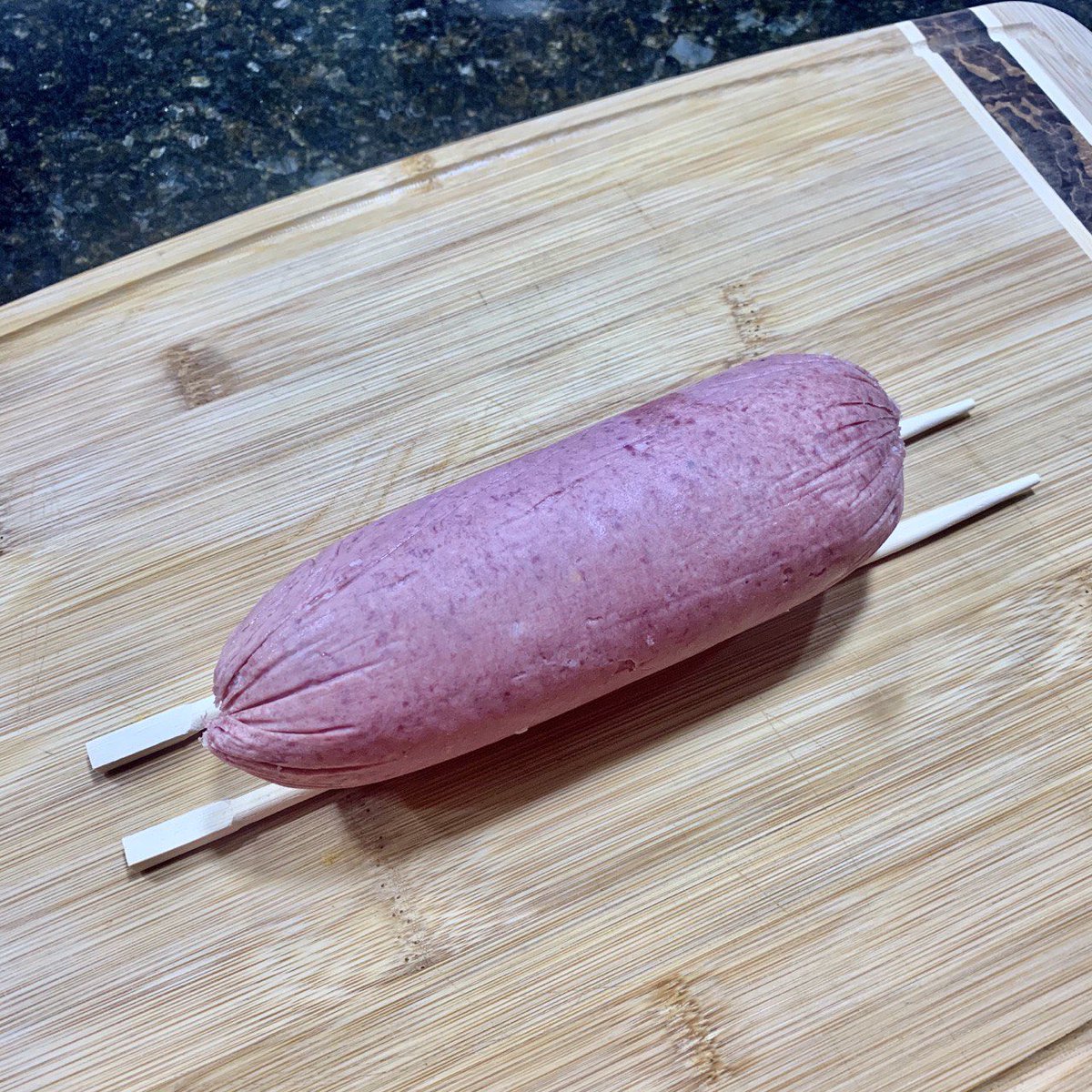 HorndumpS's tweet photo. @s3ulgl @ali_sivi It’s the very end of the salami, bunched together due to the muslin cloth wrapped around it during the aging process. They’re usually discarded, but it’s likely the end got caught on the slicer blade before sticking to another slice later on. https://t.co/GAyUzO97fL
