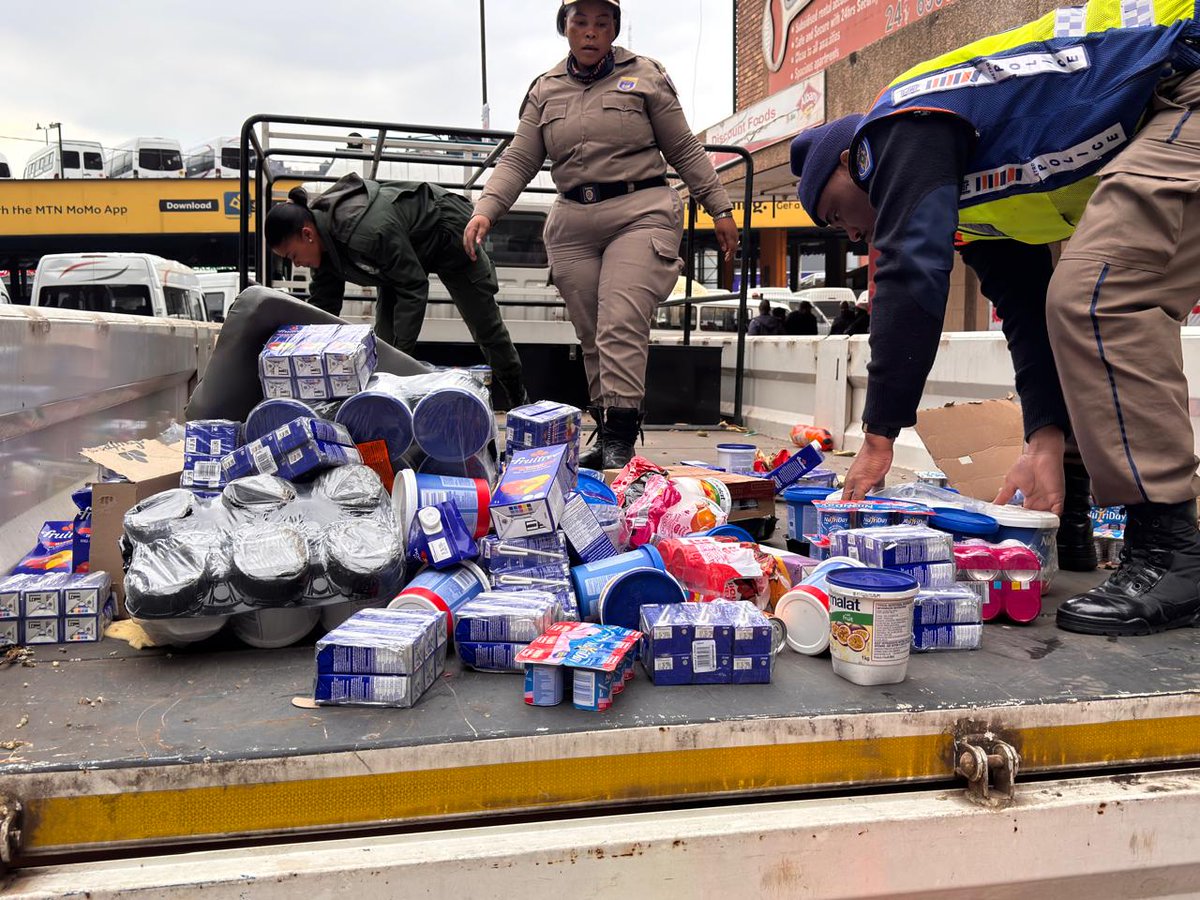 JoburgMPD's tweet photo. 🚨 JMPD HIGH-IMPACT OPERATION SUCCESS 🚨

JMPD officers have uncovered an illicit operation at a building on Edith Cavell & Plein Streets in the CBD.

During an inner-city operation, vendors fled from officers, leading police to a building that served as a hub for counterfeit food packaging and infrastructure theft.

🔍 What was found:

 * Counterfeit Food Lab: Expired juices & yoghurts being treated with chemical thinners to erase original expiry dates and replace them with fraudulent, extended stickers.

 * Stolen Infrastructure: Cut electrical cables, highly suspected to be stolen municipal infrastructure contributing to power disruptions.

"What we uncovered today is not just a violation of municipal bylaws, but a direct and dangerous assault on the health and safety of our residents."

JMPD Chief of Police, Commissioner Patrick Jaca

All goods and cables have been confiscated.

Please remain vigilant when purchasing goods from unregulated vendors.

📞 Report suspicious activity to the JMPD hotline: 011 375 5918 or 0800 002 587.#JMPDInAction #SaferJoburg #BuyaMthethoManjeNamlanje