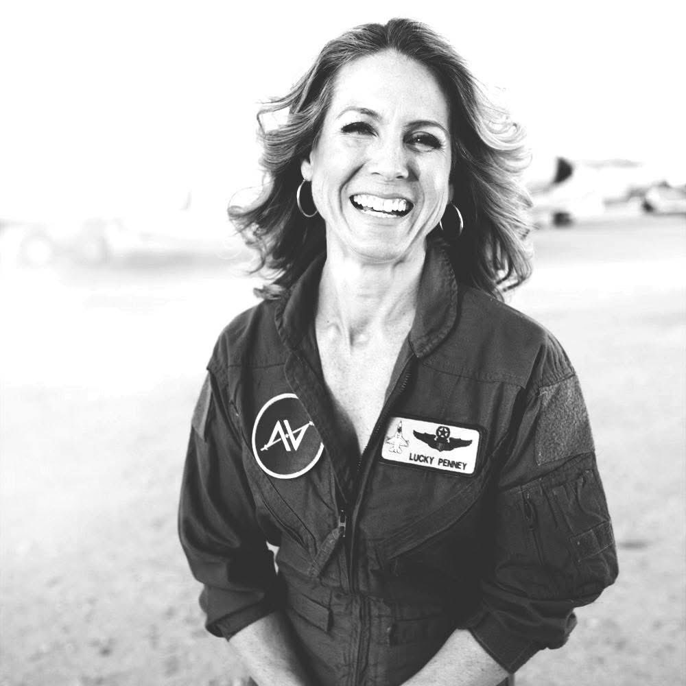 MrPitbull07's tweet photo. "She climbed into an unarmed fighter jet with orders to ram a hijacked Boeing 757—knowing she wouldn’t survive. She was 26 years old, and she had approximately eight minutes to accept her own death.
Andrews Air Force Base, Maryland. September 11, 2001. 10:00 AM.
First Lieutenant Heather “Lucky” Penney was in the air on a routine training flight when the order came through: return immediately. America is under attack.
When she landed, everything had changed. Both Twin Towers were burning. The Pentagon had been hit. And more hijacked planes were still in the sky.
Then came the worst part—there were no missiles loaded on her F-16. It was a training aircraft. No live weapons. Nothing capable of stopping a passenger jet.
Only one option remained.
“Penney, Sasseville—suit up. NOW.”
Within minutes, she and her commander were sprinting to their jets. Ground crews were still removing safety pins as intelligence came in: another hijacked plane, Flight 93, possibly headed for Washington.
The White House. The Capitol. No one knew which.
But someone had to stop it.
As she climbed into her cockpit, a crew chief looked at her and quietly said, “Good luck, ma’am.” Neither of them said what they both understood.
If they found the aircraft, they might have to ram it.
There would be no second chance. No ejection that could save her. Only impact.
On the radio came the order that defined everything:
“Stop that aircraft by any means necessary.”
She didn’t ask for clarification.
There wasn’t time.
Moments later, her F-16 roared down the runway and lifted into the sky. Within seconds, she was flying over Washington at supersonic speed—sonic booms shaking the city below like distant thunder.
Smoke still rose from the Pentagon.
She searched the sky for a Boeing 757 she might have to destroy with her own jet.
But 200 miles away, something else was happening.
Passengers on Flight 93 had already made their own impossible choice.
They stormed the cockpit.
At 10:03 AM, the plane crashed into a field in Pennsylvania.
All 44 people aboard died—but Washington was saved.
Heather never had to complete her mission.
She circled the capital for hours afterward, protecting a city that had already been spared by strangers who refused to be victims.
When she finally landed, the crew chief was waiting. He looked at her and said quietly, “I didn’t think I’d see you again.”
Neither had she. "