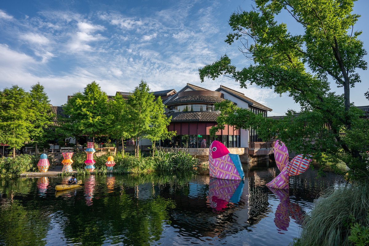 QingpuShanghai's tweet photo. #InnovativeQingpu This #DragonBoatFestival, #Qingpu's Panlong Xintiandi invites you to a riverside escape where centuries-old Jiangnan waterways meet contemporary #lifestyle. Wander through historic lanes, explore quality dining options, lifestyle boutiques and creative stores, and enjoy a relaxed getaway by the water. #ShoppingInChina