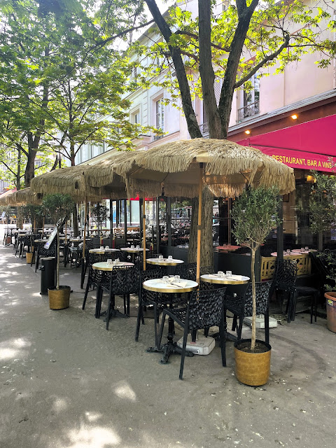 Paris_all_about's tweet photo. Terrace time in Paris but with a distinctly tropical twist. Straw parasols in Montparnasse providing welcome shade and proving that Paris café culture adapts very well to summer heat.  https://t.co/WiYi1BMTHC https://t.co/kyFUuOlt7G
