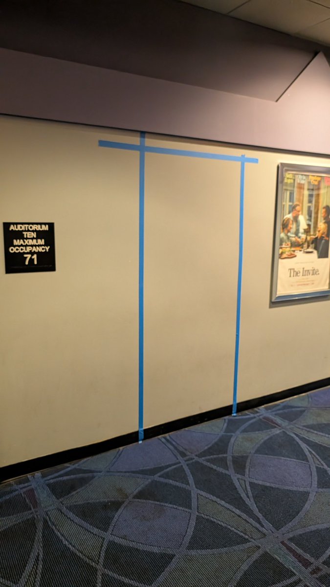 EvereeCat's tweet photo. My local theater did this outside the auditorium for the Backrooms and I love it. https://t.co/AGN3bygpOn