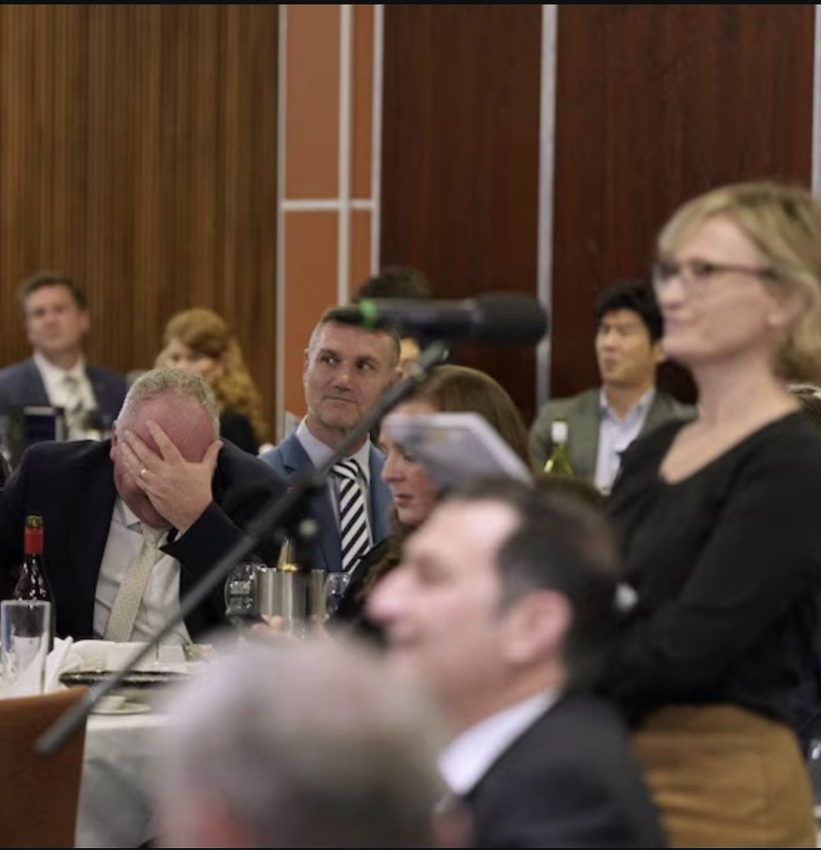 mlbkiwi's tweet photo. Barnaby Joyce does a face palm as Pauline Hanson abuses reporter at the National Press Club on Wednesday #auspol https://t.co/6RahKXHeHL