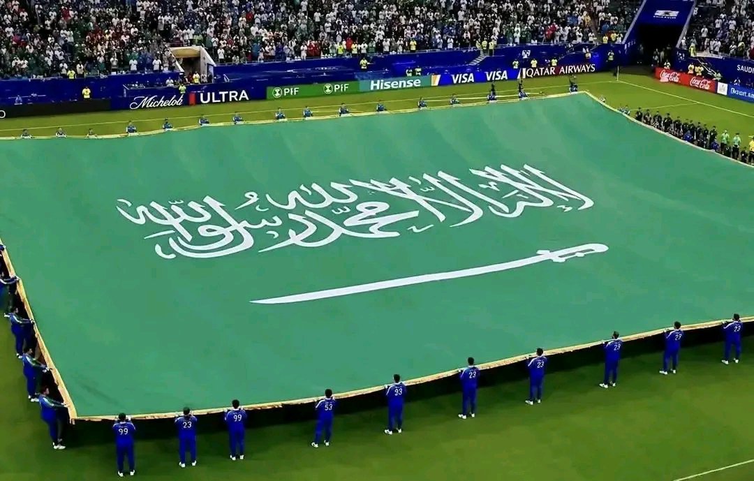 ishaqmasari5's tweet photo. FIFA Makes Special Exception for Saudi Arabia's Flag

The world football governing body, FIFA, has approved a request from the Government of Saudi Arabia that its national flag should not be placed on the ground during pre-match national anthem ceremonies.

Saudi Arabia's flag, which bears the Islamic declaration of faith (Shahada), is reportedly the only one among the participating nations whose flag will not be laid on the pitch before matches.

Many have welcomed the decision, viewing it as a mark of respect for the sacred Islamic inscription on the flag and an acknowledgment of its religious significance.