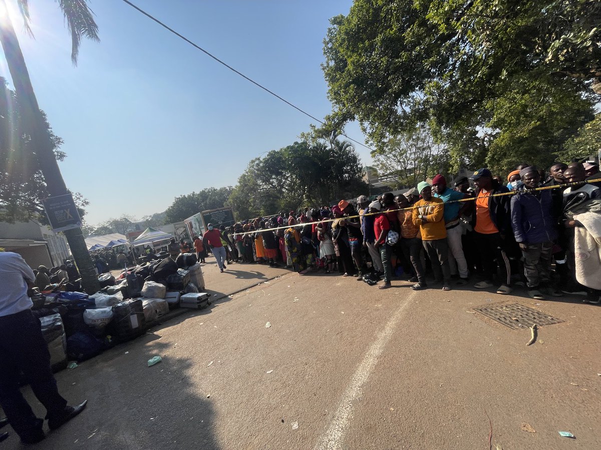 Logic_Malinga's tweet photo. Police have maintained a heavy presence at Durban’s Sherwood Hall transit site as the repatriation of Malawian nationals continues. A fourth bus has already departed today, while more migrants are being processed and verified before returning home. #sabcnews https://t.co/ifdw9Z4vVH