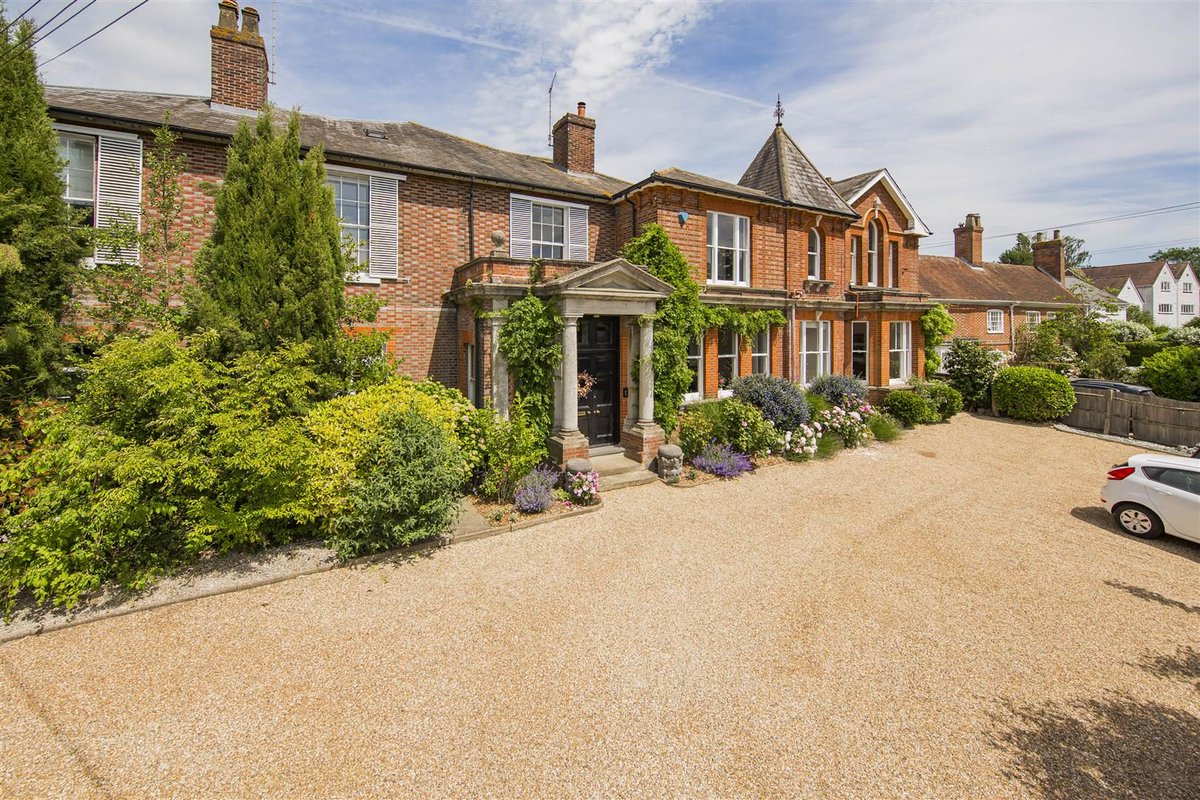 homeuk's tweet photo. Fashion designer Karen Millen once lived here, and it shows. Gransden is a Georgian house in the Kent village of Wateringbury. Charcoal walls meet honey stripped-pine floors, stained-glass arches glow above the front door, and coffered ceilings sit over marble fireplaces room after grand room.

Five thousand square feet across four floors: six bedrooms, three reception rooms built for crystal-glass evenings, a self-contained apartment on the top floor, and a three-chambered wine cellar for the serious collector. Parking for six plus an EV charger, the village station three-quarters of a mile off, London Bridge in 44 minutes. £1.45M in a conservation-area village.

https://t.co/4amj8b9b89 ❤️

For sale with @Ibbett_Mosely on Home