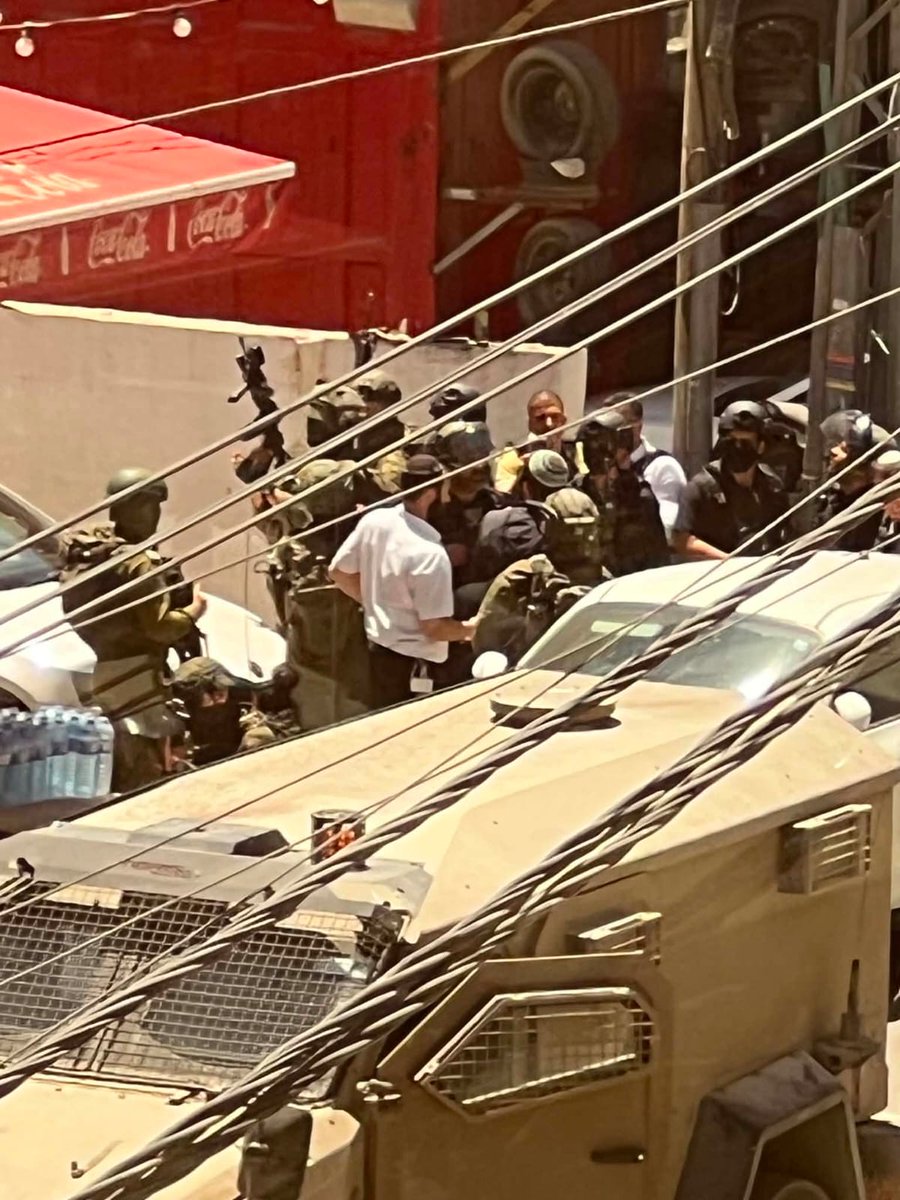 jerusalemgov's tweet photo. Israeli Knesset member Zvi Sukkot entered the vicinity of several schools in the town of Kafr Aqab, north of occupied Jerusalem, today under heavy protection from the Israeli army and police. https://t.co/cPHt4yy9Ly