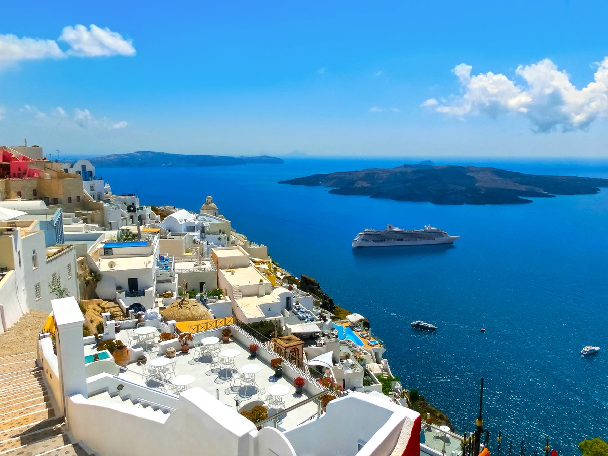 VacationBuzz's tweet photo. See Oia and Fira the effortless way with Royal Caribbean’s Ultimate Santorini Day 💙✨ Blue domes, cliffside paths, cafés, shops — the island’s best, all in one seamless shore excursion.

Don’t just scroll past Santorini — contact me at info@tastefuljourneys.com to make it real! https://t.co/SgekllQ03b