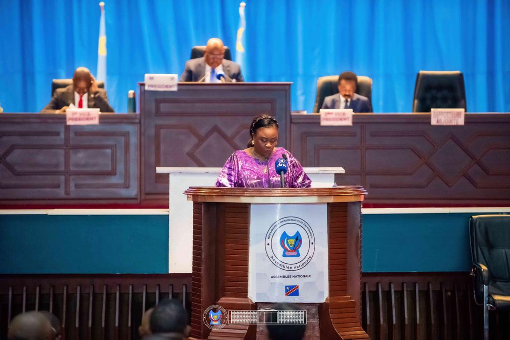 S_mumba's tweet photo. Clôture de la session ordinaire de mars 2026 : Hon. @MutitaClotilde présente le rapport du Bureau de l'@AssembleeNatRDC entre initiatives législatives, actions de contrôle parlementaire, contrôle budgétaire et exécution des résolutions et recommandations adoptées par l'#AN. https://t.co/kyOIKdsocd