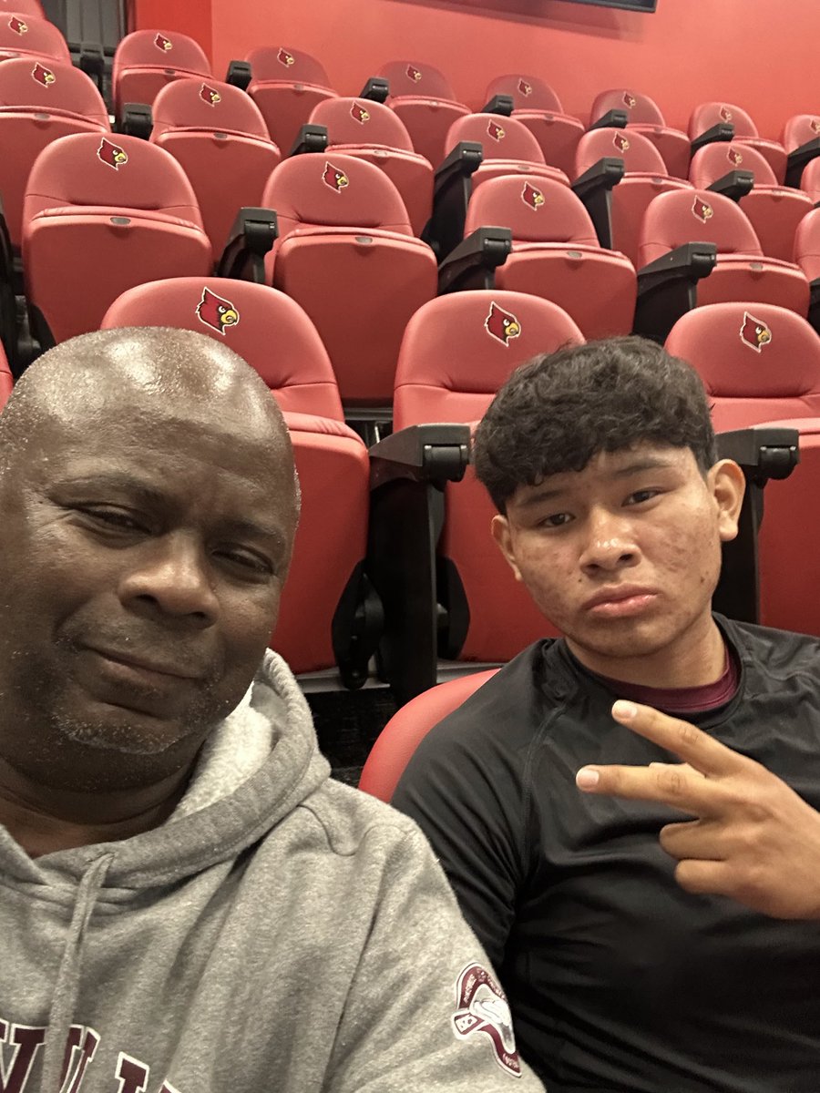 SantesSteven's tweet photo. Checking in from the University of Louisville Specialist Camp with my Coach, Sam. Ready to compete and get some work in. 🏈 #ClassOf2027 #Kicker @LouisvilleFB @CoachMaslowski https://t.co/kclr0A9Tp7