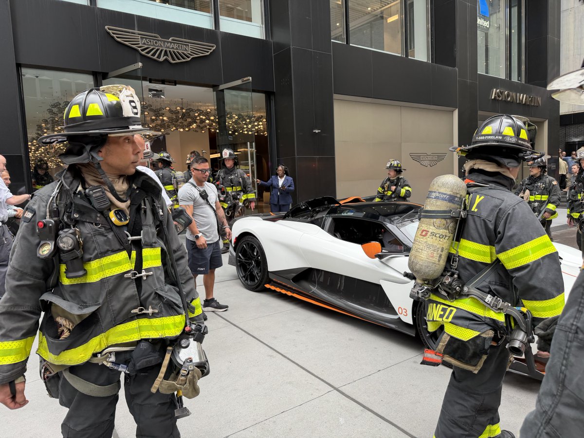 ThisEastSide's tweet photo. Only on Park Avenue.  An overheated Aston Martin drew the attention of three fire trucks.  Sidewalk on the west side of the street, between 56th and 57th was cordoned off. https://t.co/DUo2muPUCU