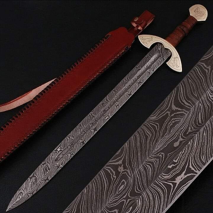 knivesmaker786's tweet photo. Hand-forged battle sword with Damascus steel blade + full-tang build. Battle-ready edge, leather/steel hilt for grip + balance. Display piece + functional cutter. Includes scabbard. DM for blade length + price!#BattleSword #SwordCollector #WeaponCollector #HandForged https://t.co/AXJHyMuwei